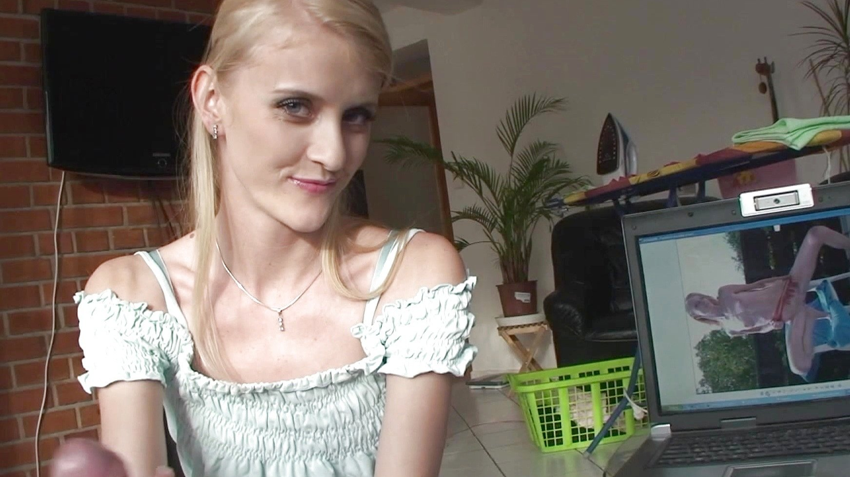 Eurobabe Gives Handjob to Man Watching Her Porns Online