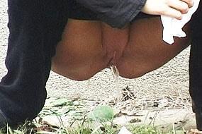 Shaved Pussy Pissing on Street