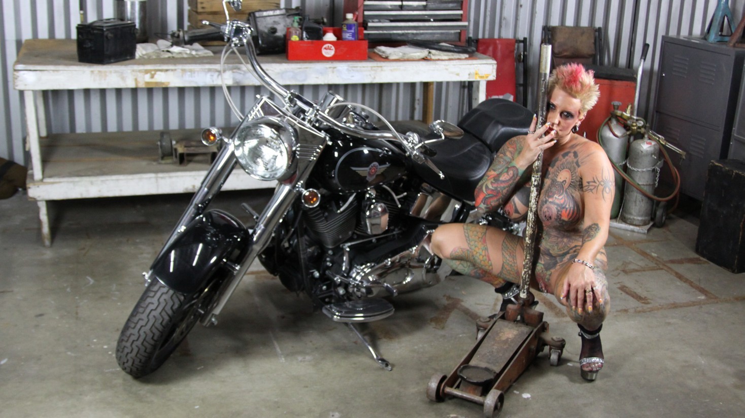 Inked MILF Blackwidow Plays with Cream and a Huge Dildo
