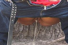 Woman in Jeans Pees Outdoor