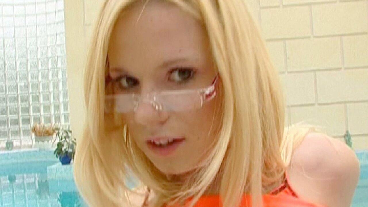 Pretty Blonde in Glasses Yasmine Sucks Off a Man By the Side of a Pool