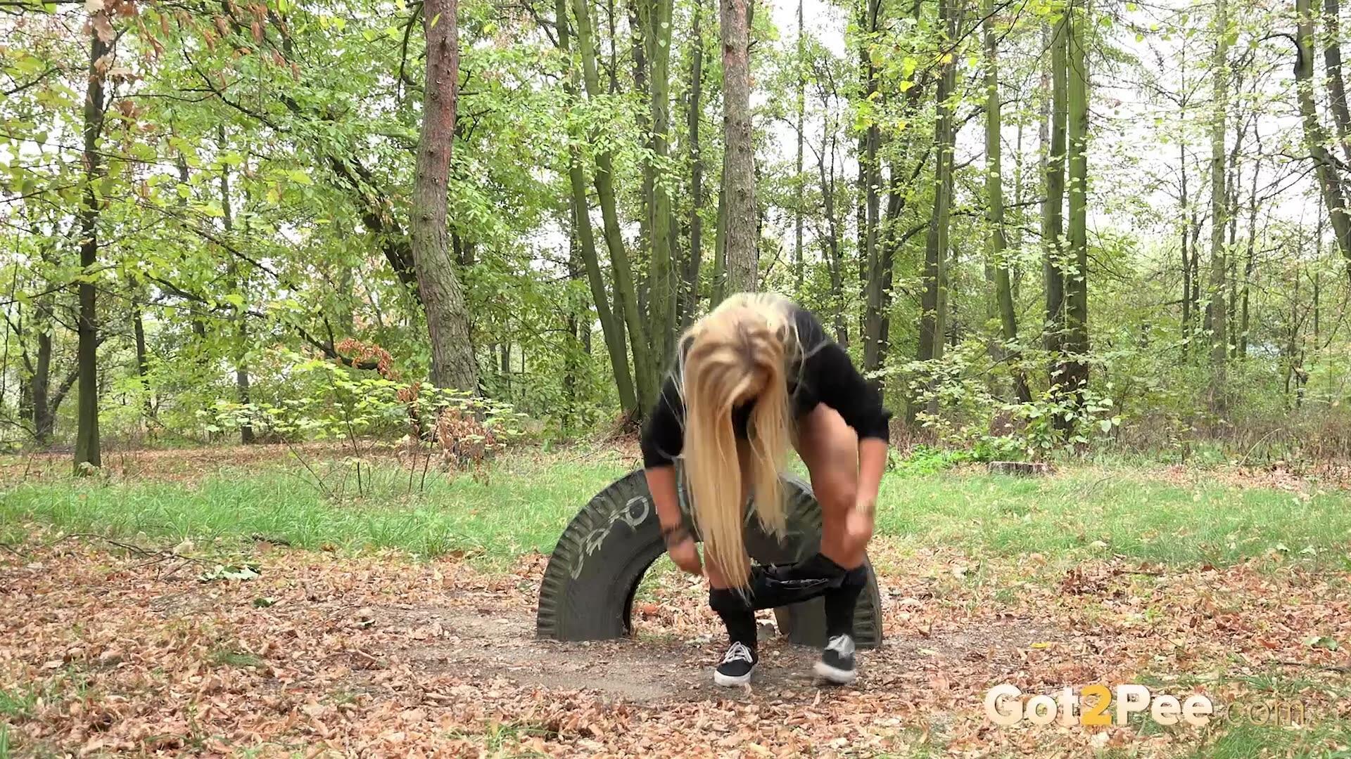 Long-Time Pissing Blonde in the Woods