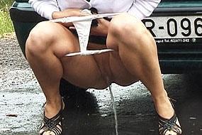 Girl Pee on Wet Road