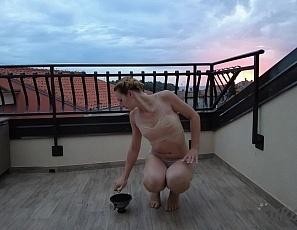 Hot Ginger Lea Doing Performative Dance While Nude and Dancing with Fire at Sunset While on Vacation