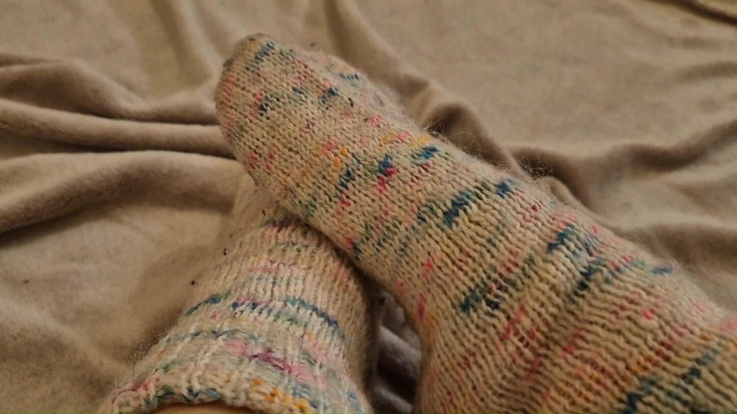 Feet In Woolen Socks