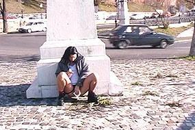 Girl Pees Behind Monument