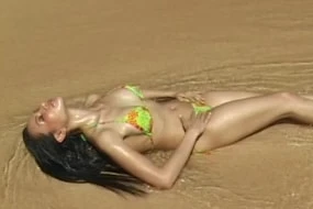 Anya Undressing on Beach