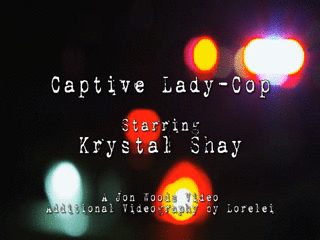 Captive Lady-Cop - Format - Screenshot 1 of 4 - Bondage