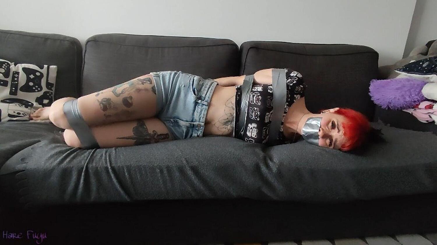 Tied And Gagged With A Silver Tape