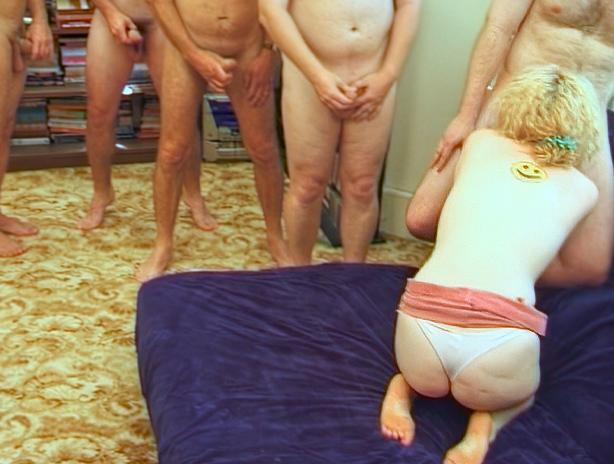The Guys Form A Big Queue To Cum Onto The Curly Haired Blonde