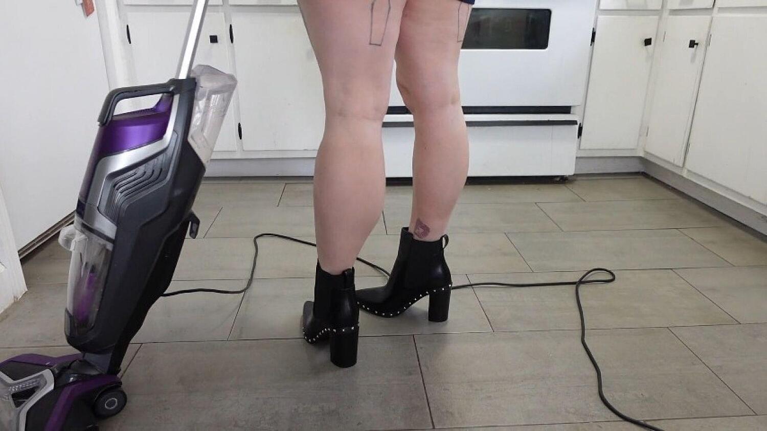 Muscular Calves While Vacuuming In Black Studded Ankle Boots