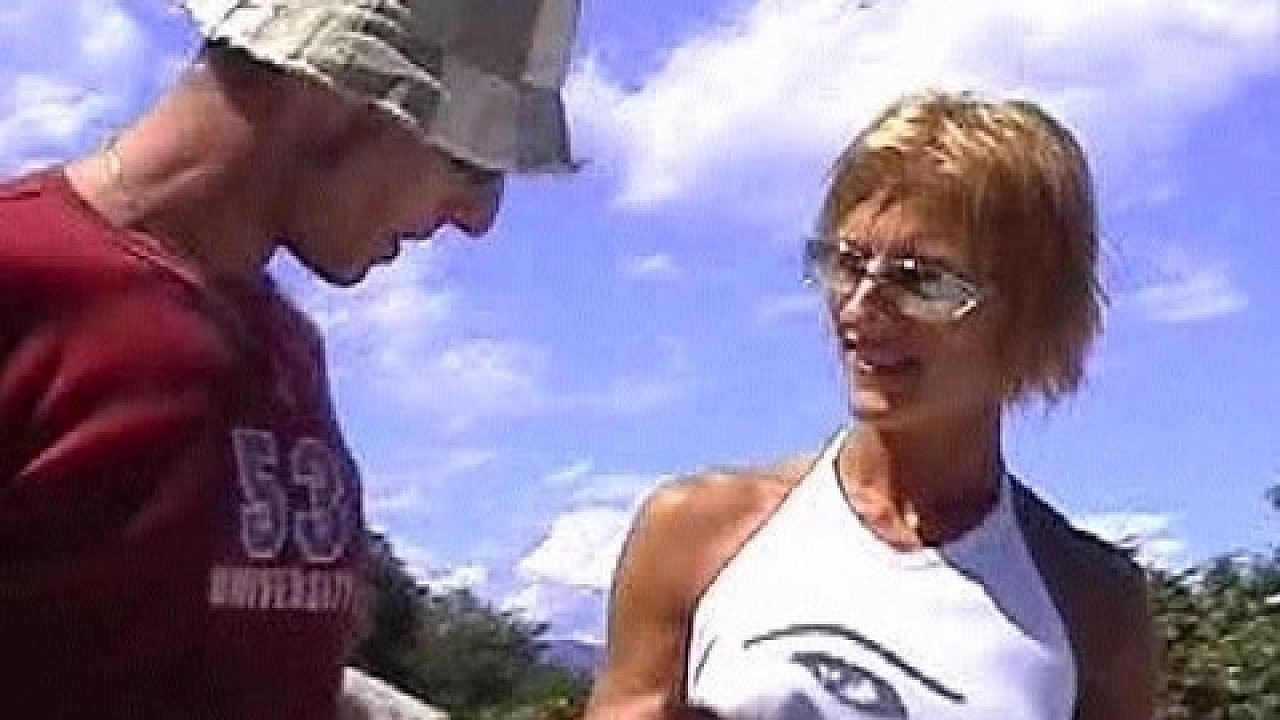 Watch Horny Couple Fucking At The Top Of A Hill Outdoors In The Sunshine