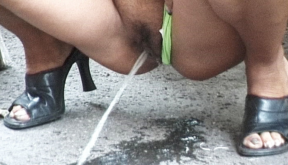 Teen Peeing on Park Alley