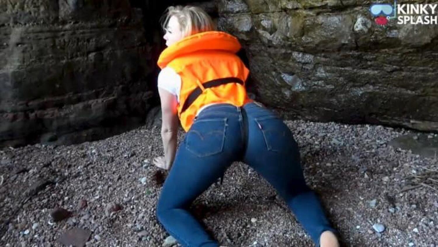 Lifejacket And Jeans On The Beach