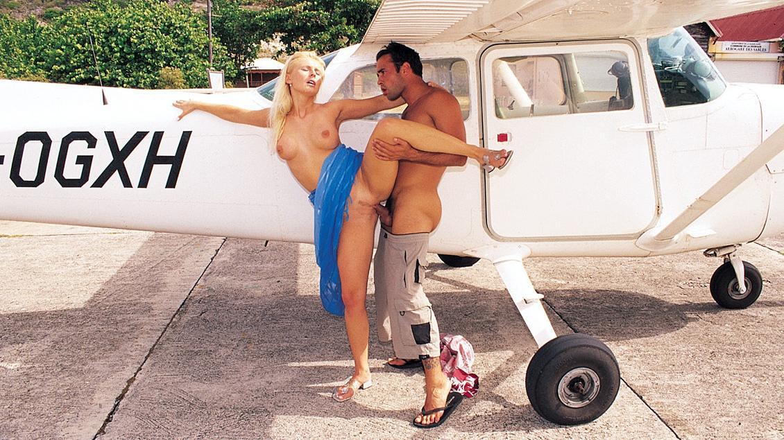 Sandra Russo Has Her Pussy Penetrated Up Against a Plane Before Anal