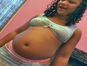 Preggo Ebony Cock Sucker Takes Cock