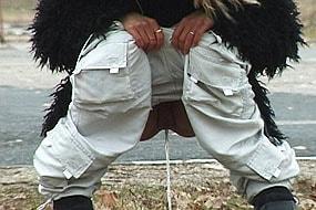 Blonde Pissing Next to Men