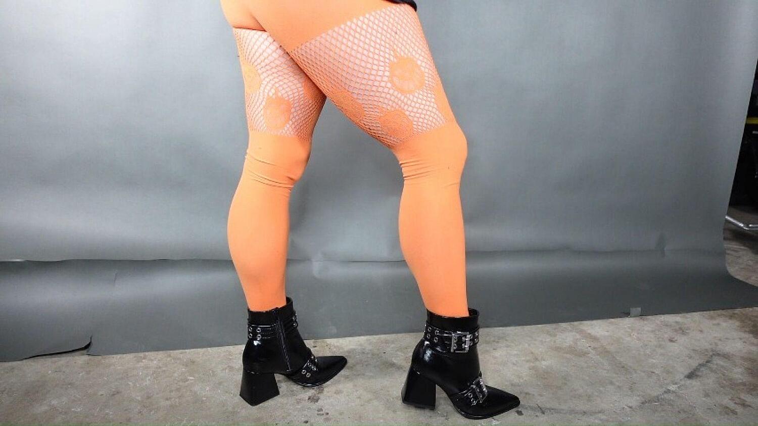 Calves In Orange Pantyhose With Pumpkin Fishnet Detailing