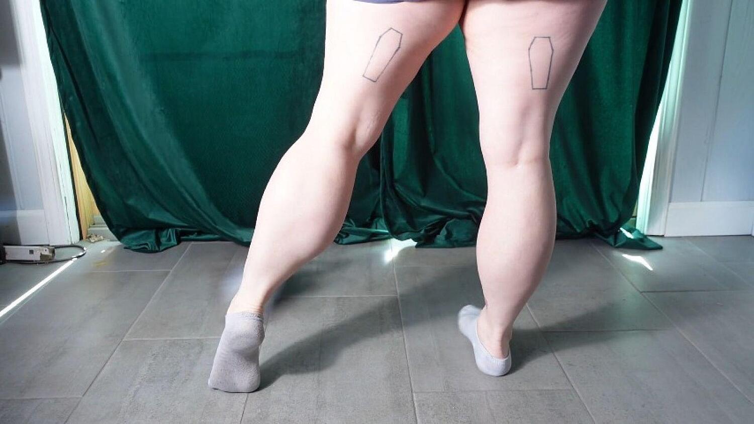 Muscular Calves In Grey Ankle Socks While Sweeping