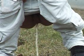Blonde Peeing on Road