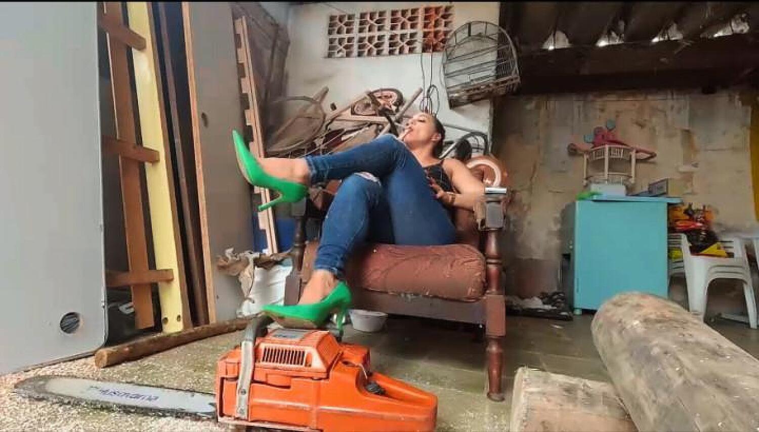 Cranking Chainsaw And Smoking