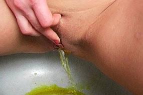 Sexy Woman Pees in Rain