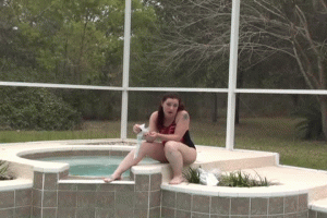 Multiple Bag Popping Poolside - Screenshot 1 of 4 - Bondage