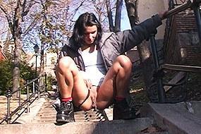 Brunette Pissing in Stairs