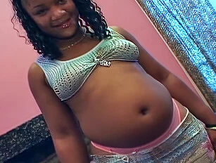 Black MILF Gets Round Pregnant Belly Oiled Before a Riding a Cock