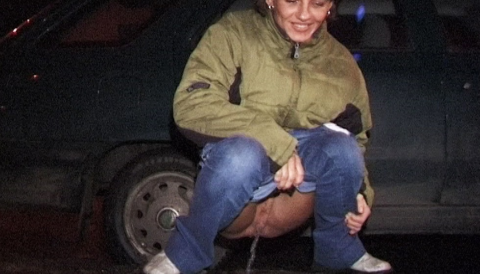 Babe Pissing Next to Car