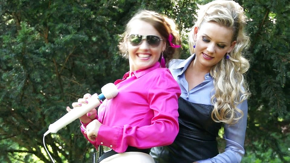 Horny Lesbians Help Each Other Out with Giant Vibrators Outside