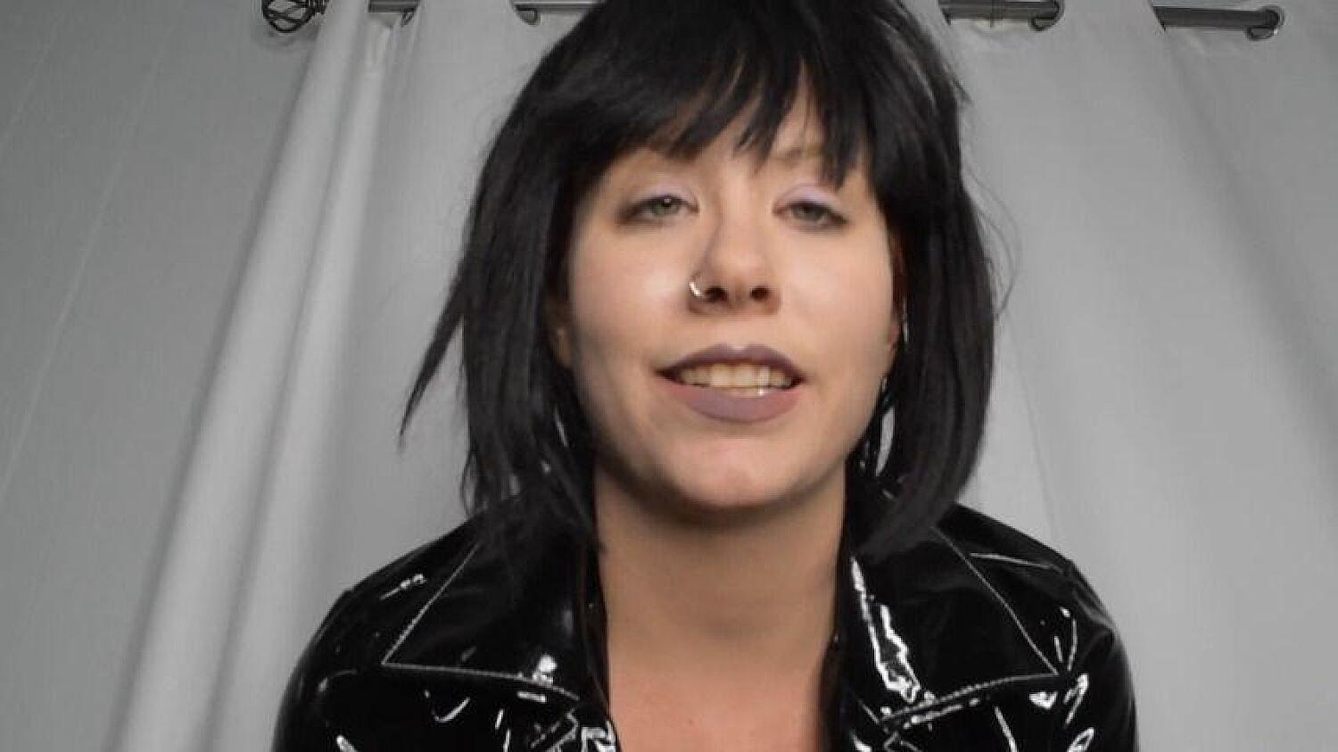 Executrix In PVC Coat Ends You