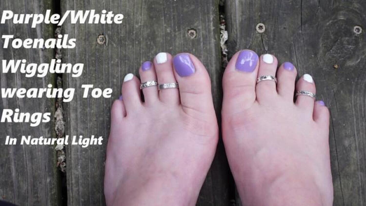 Purple And White Toes Wiggling Wearing Toe Rings